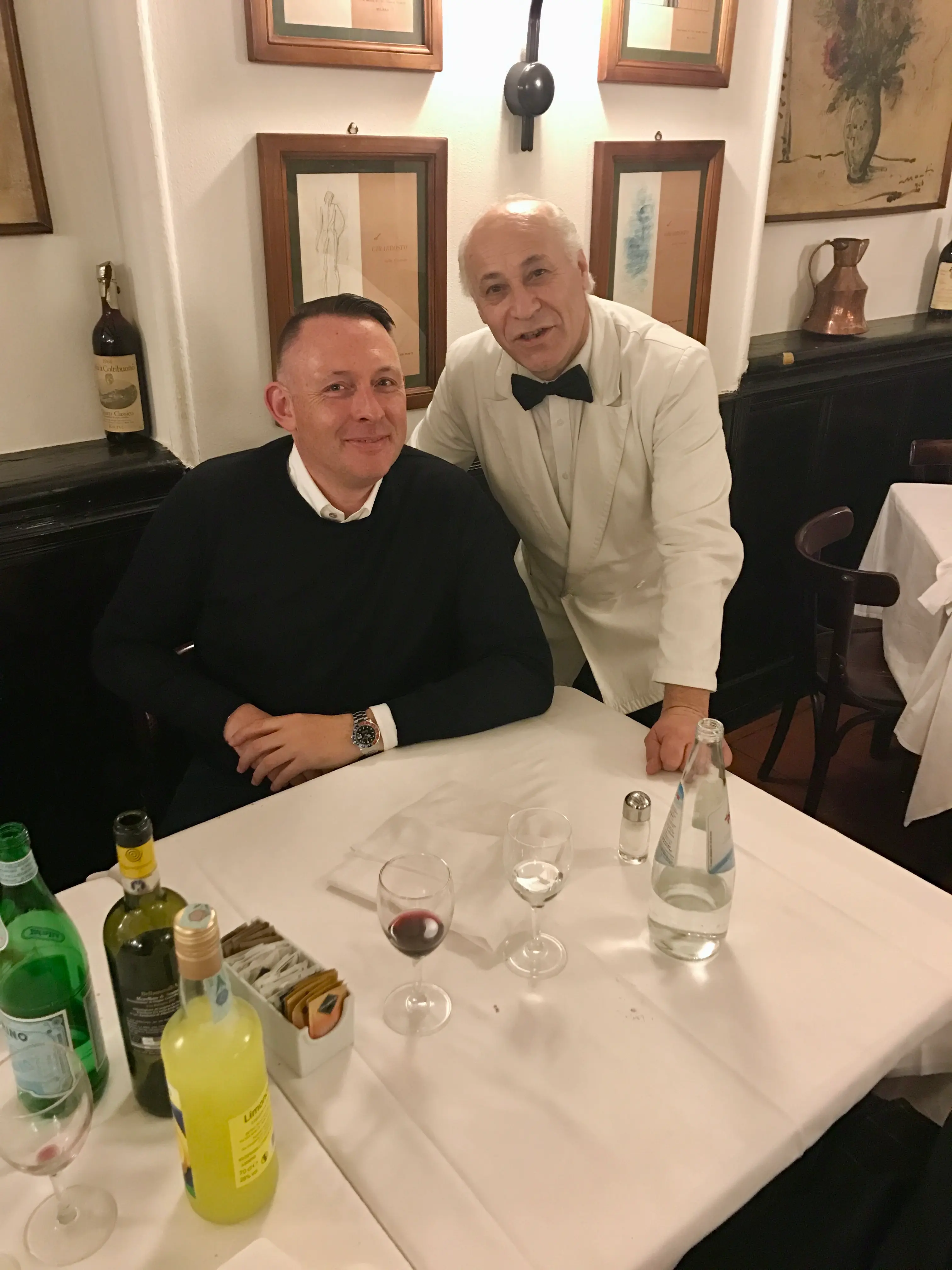 Murray Crane and restaurant owner in an Italian restaurant