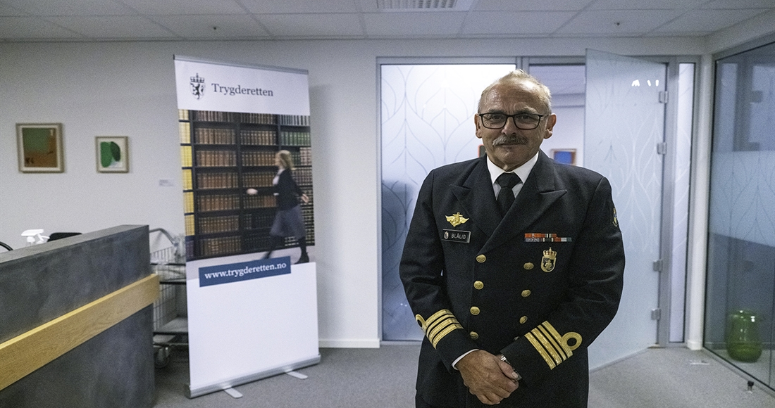 Bilde av person i sjøuniform.