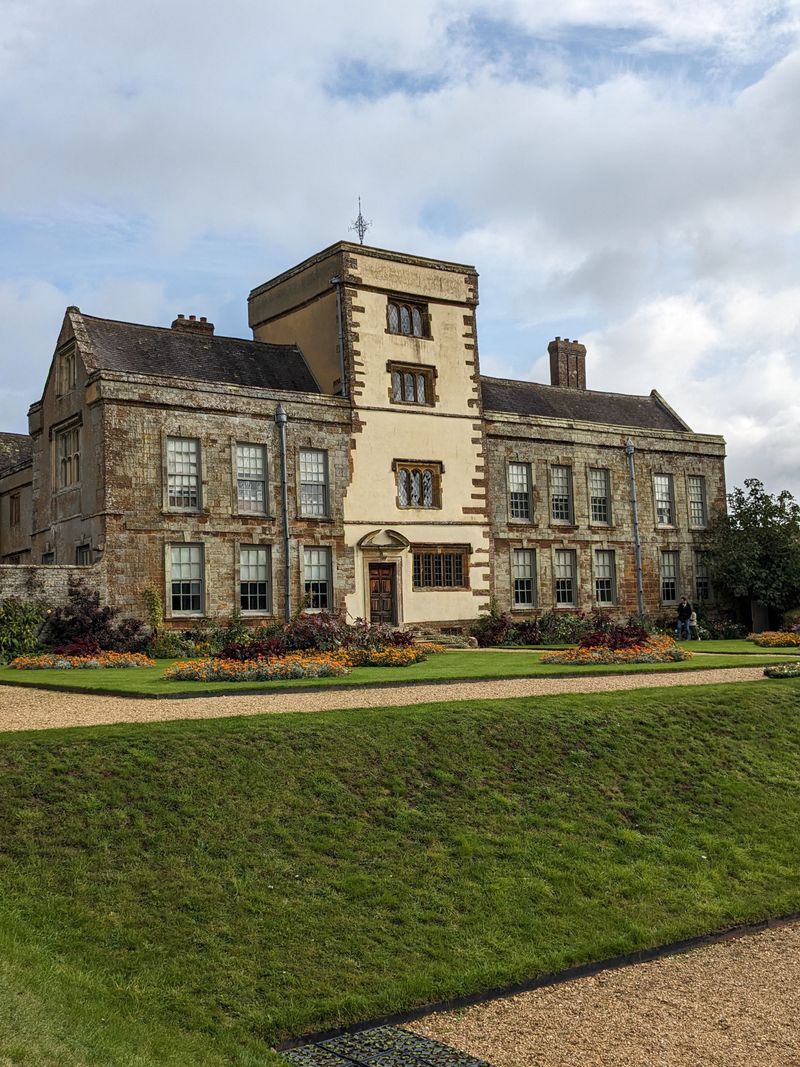 Historic manor with lush estate grounds and pathways