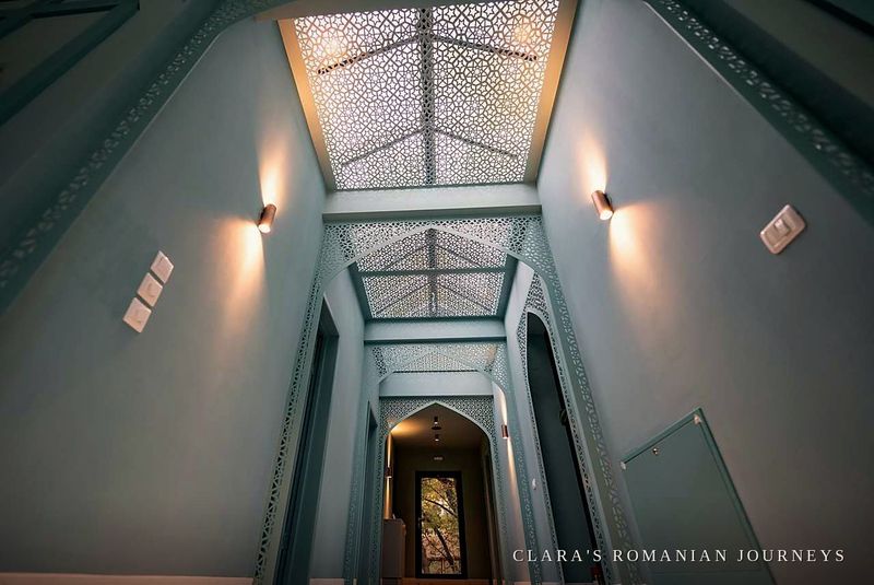 Moorish-arched skylight corridor in the wellness wing
