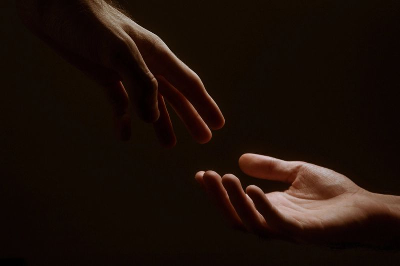 Volunteers joining hands