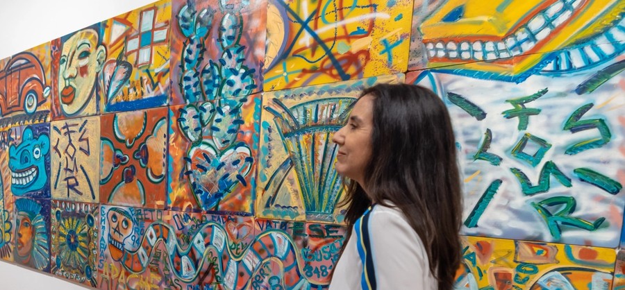 Gallery corridor featuring artwork from AltaMed's collection