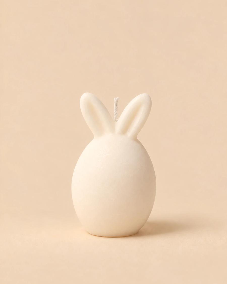 Vela em forma de ovo com orelhas de coelho