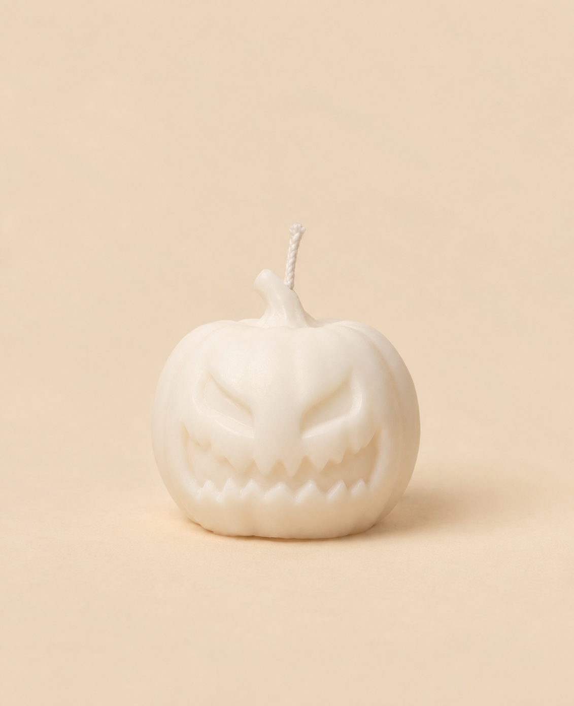 Vela em forma de abóbora de Halloween