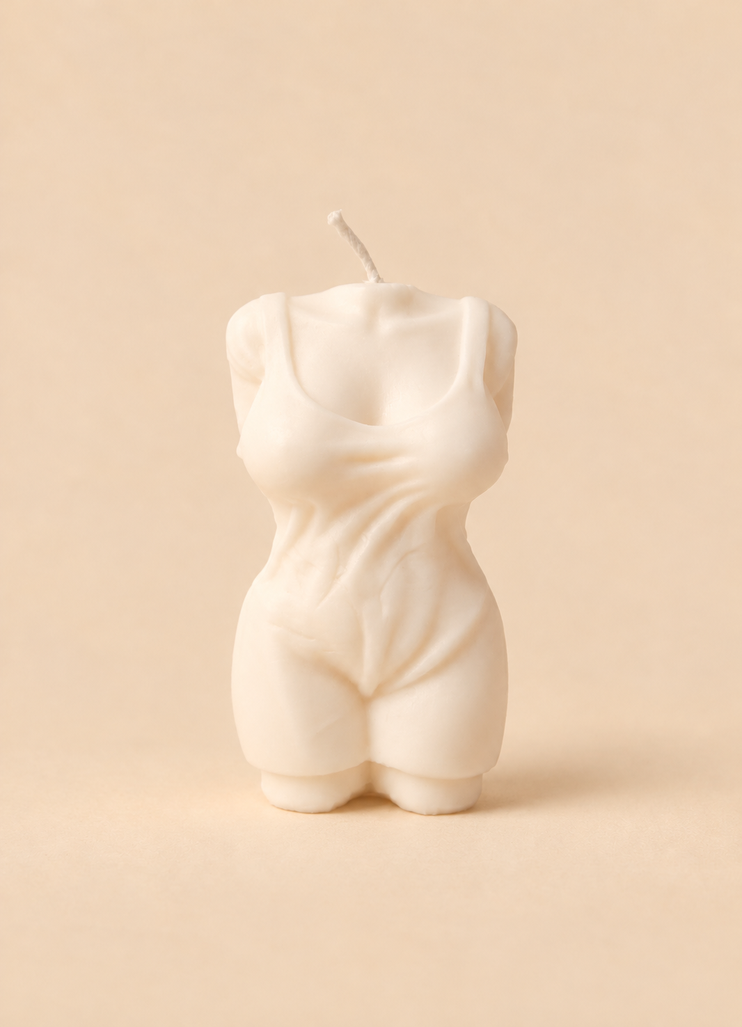 Vela em forma de torso feminino