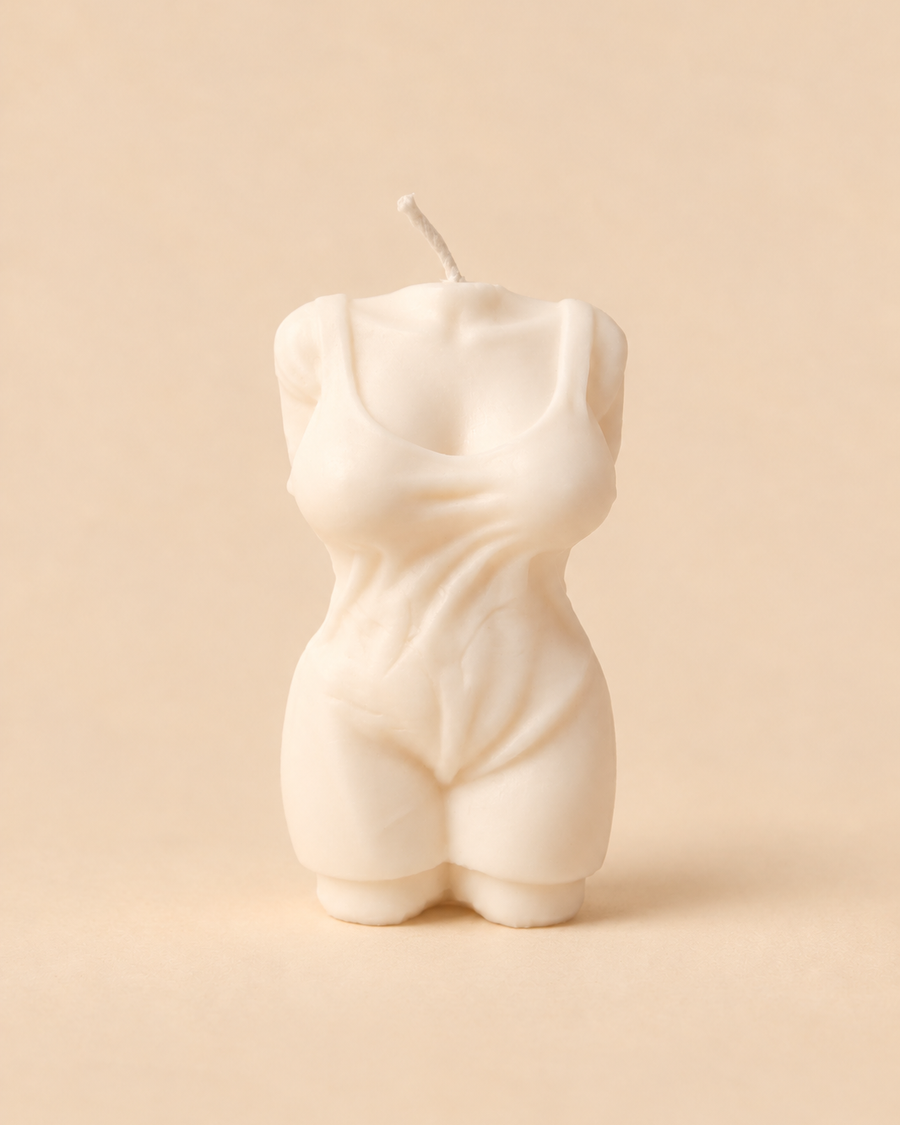 Vela em forma de torso feminino