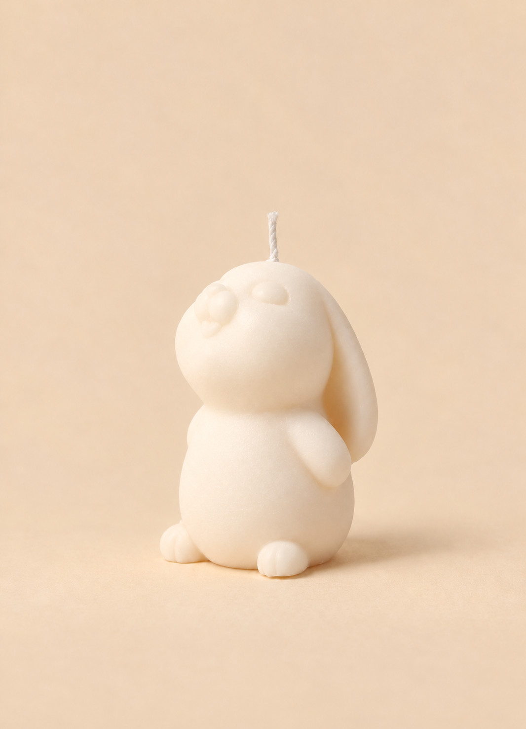 Vela em forma de coelhinho sentado