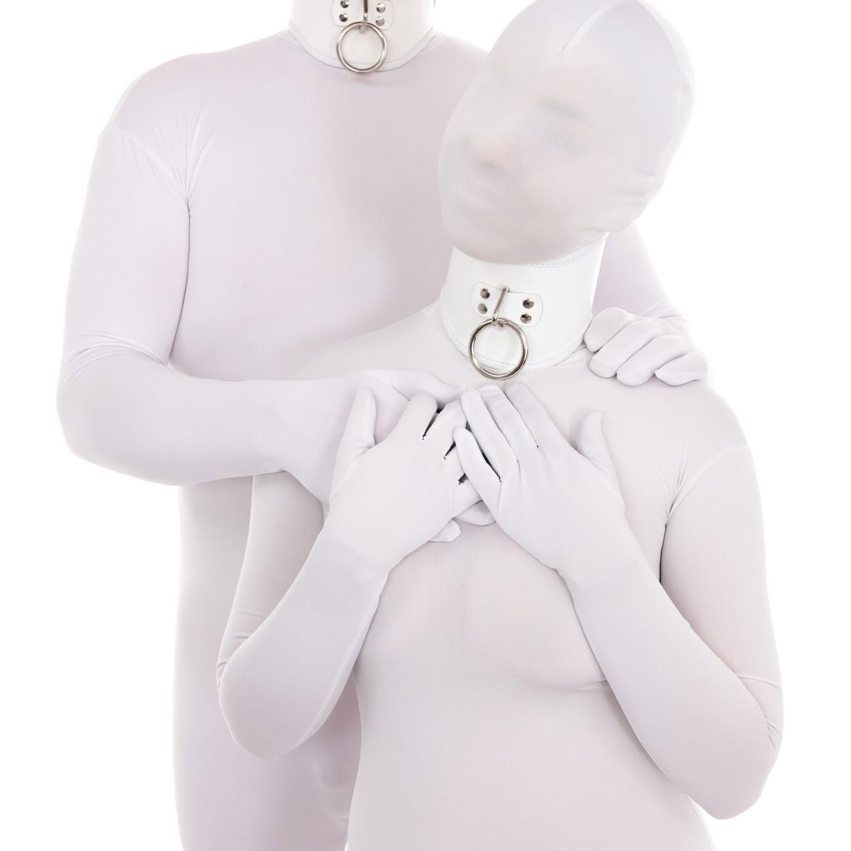 Different Bodies - A man and woman, both wearing white bodysuits called "zentas"
