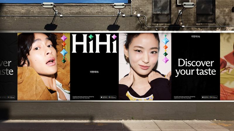Street hoarding with portraits