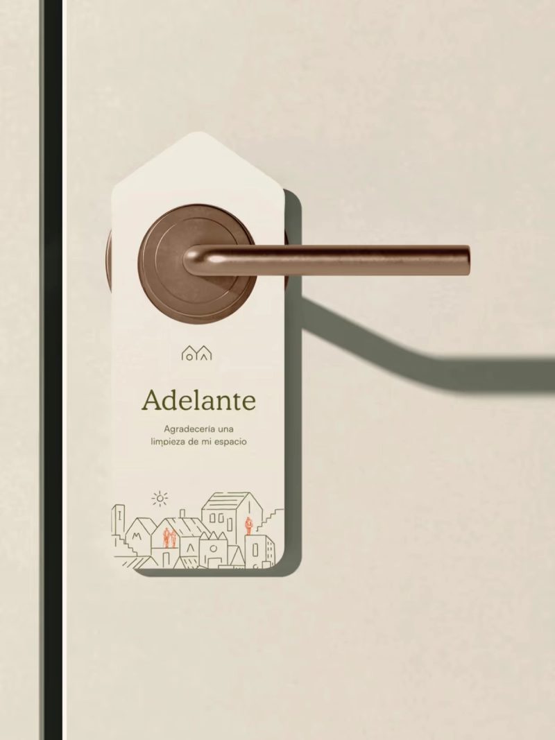 Adelante door hanger