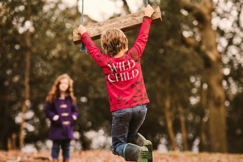 WILD CHILD on a rope swing