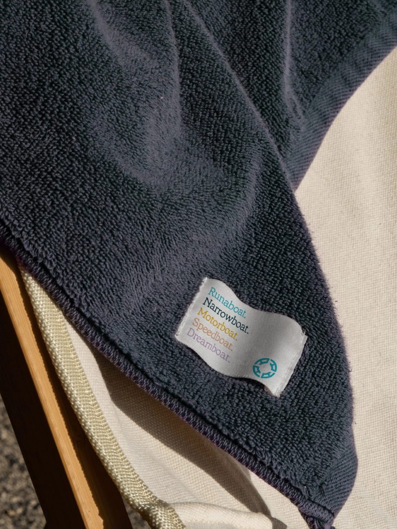 Samboat Detail / Close-up: Towel label, brand identity by Dave Rax