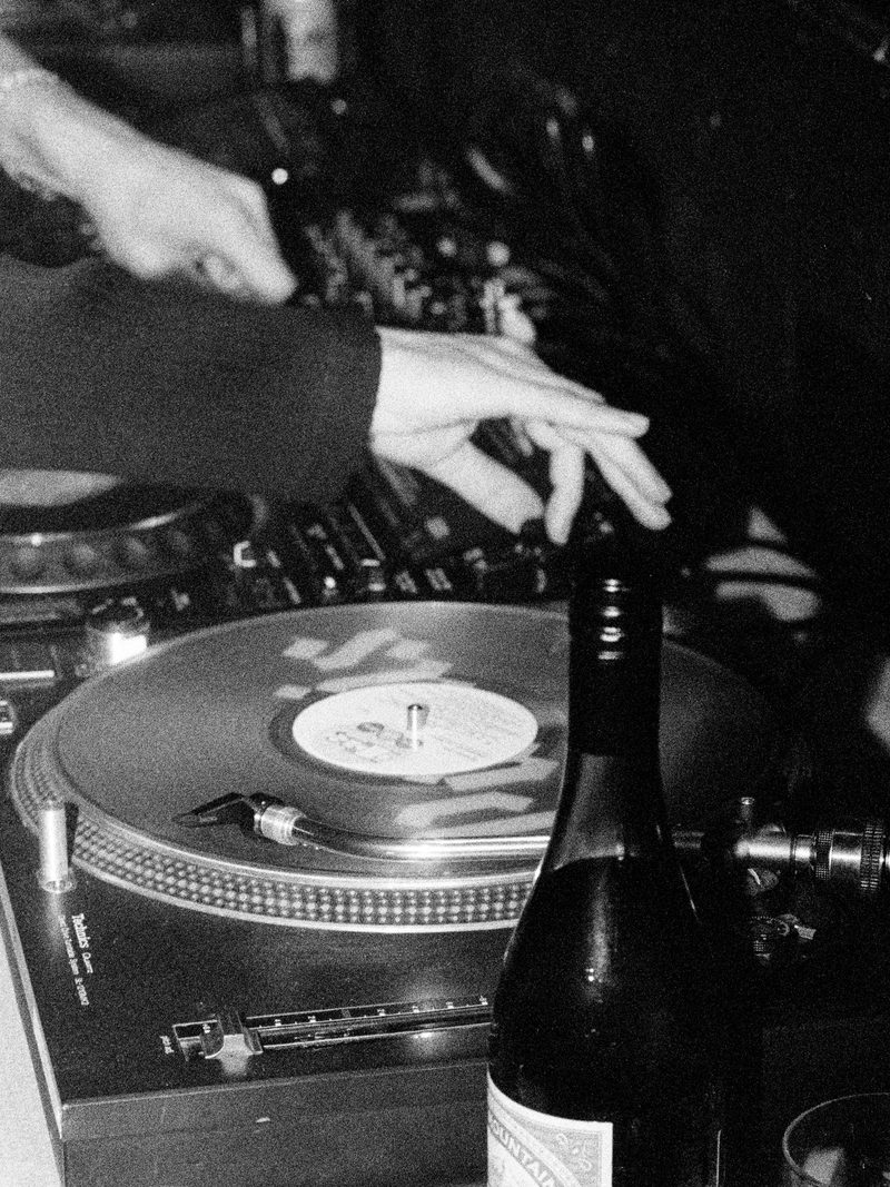 Hands on a turntable