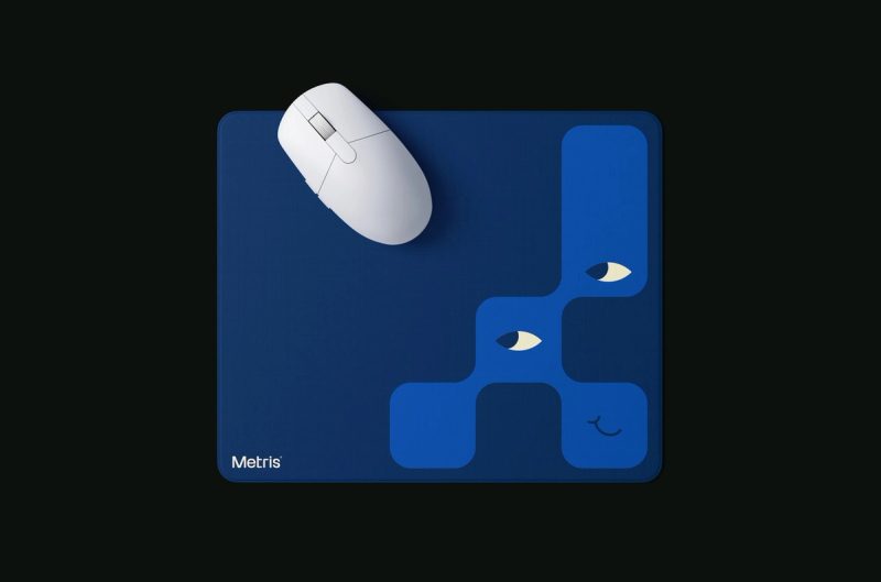 Branded Mouse Pad with Playful Face Design