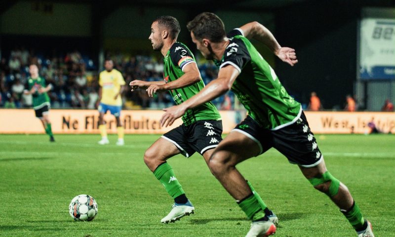 Soccer Players in Green Kit