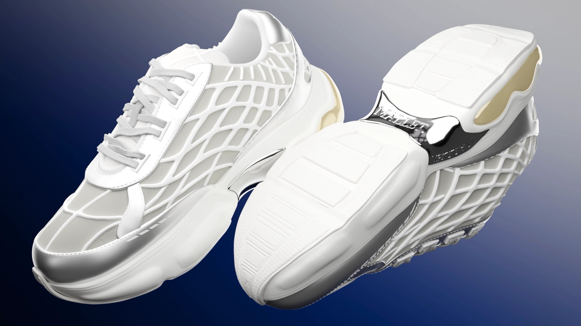 Closer view of the pair, with the "MALLET" lettering legible on the chrome plate in the sole of the tipped-back shoe.