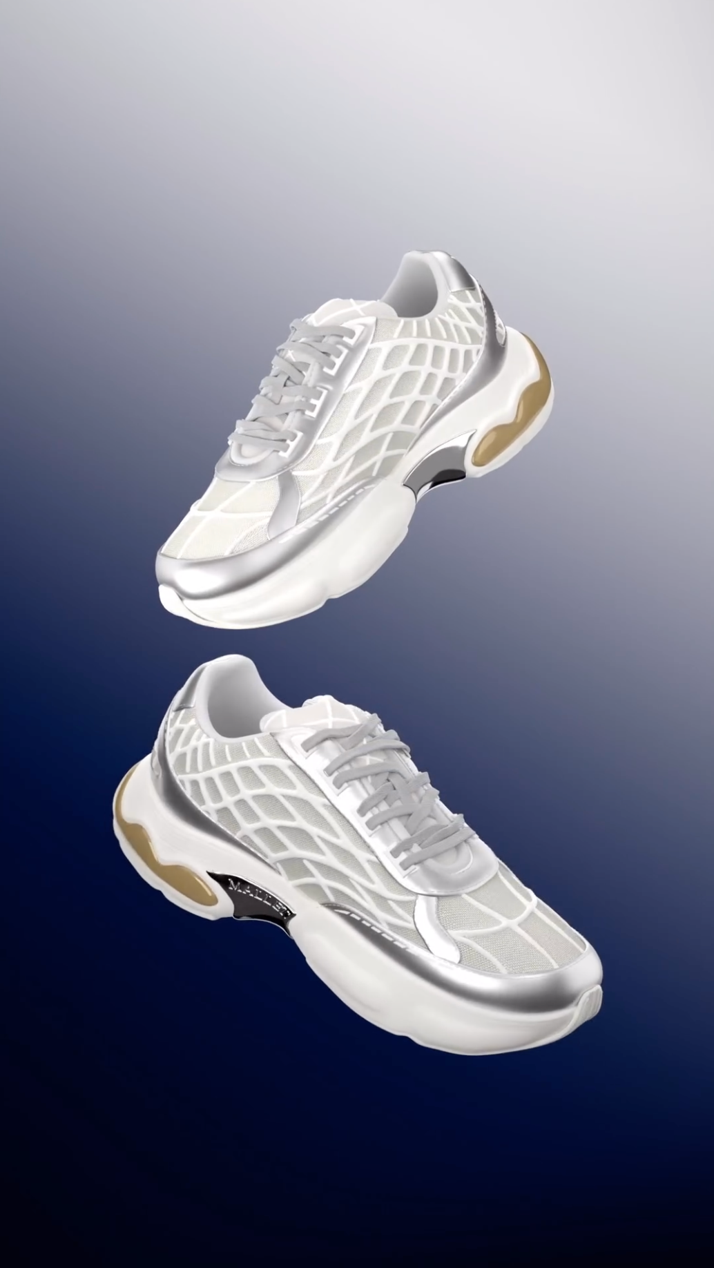 Vertical render of two sneakers floating one above the other and facing opposite ways, in white and silver with gold heel units.