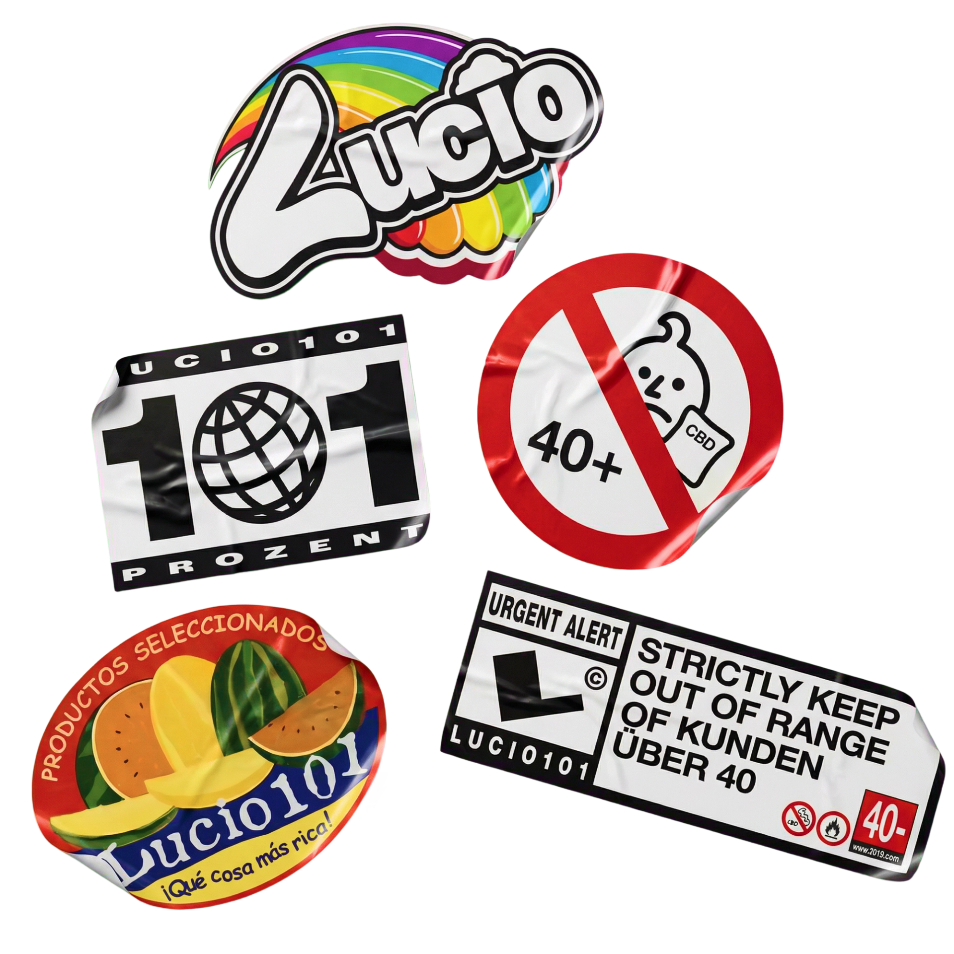 Five album stickers on black: a rainbow Lucio logo, a "101 PROZENT" globe badge, a no-over-40s sign, a melon fruit label and a warning label.