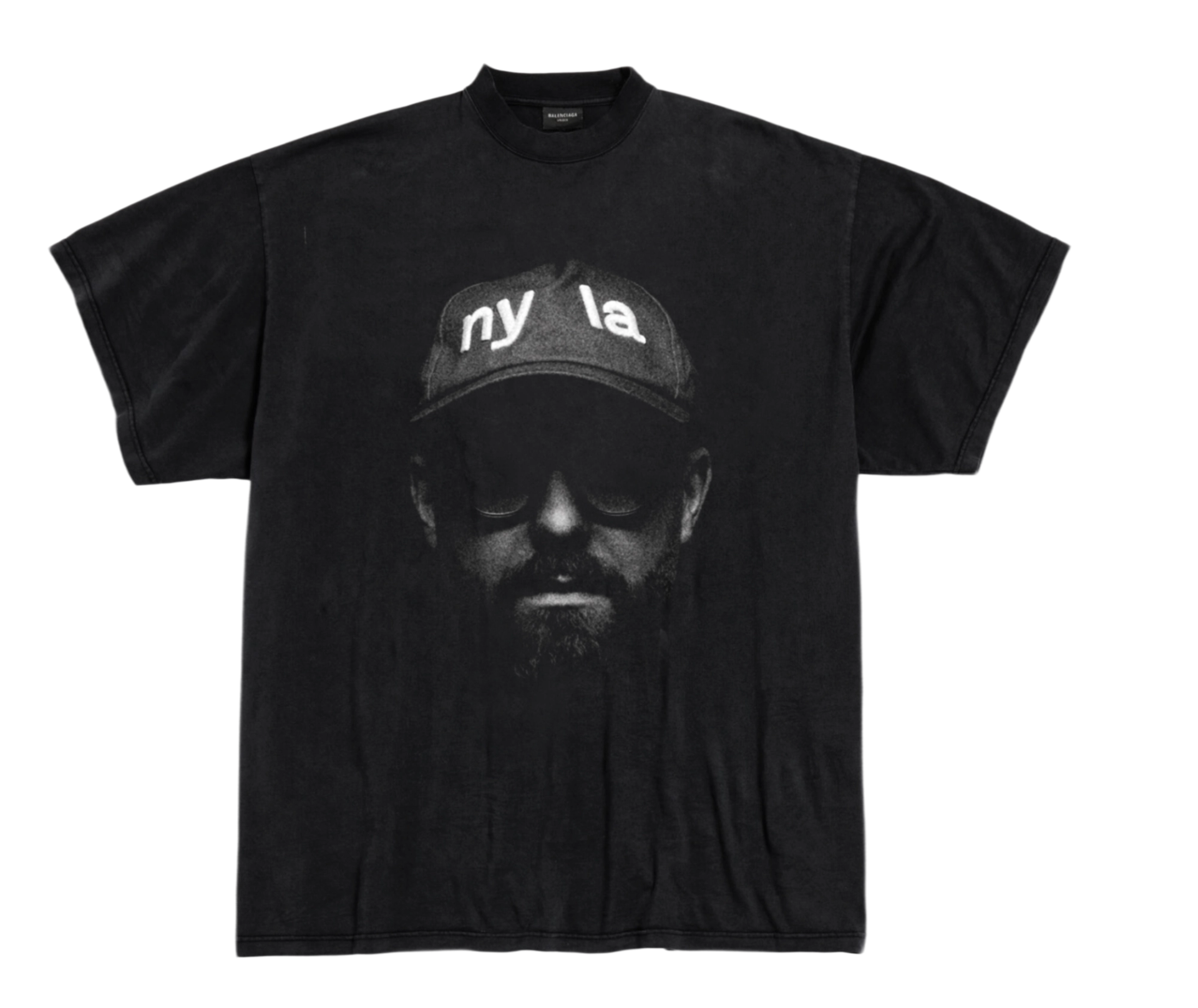 Black tour T-shirt with a black-and-white portrait print of the artist, his eyes in shadow under a cap reading "ny la".