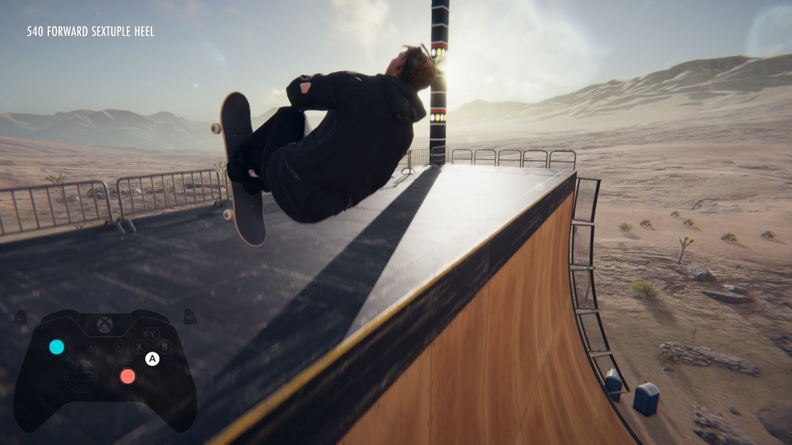 Mid-air trick above a wooden halfpipe in a desert, captioned "540 FORWARD SEXTUPLE HEEL" like a skateboarding video game.