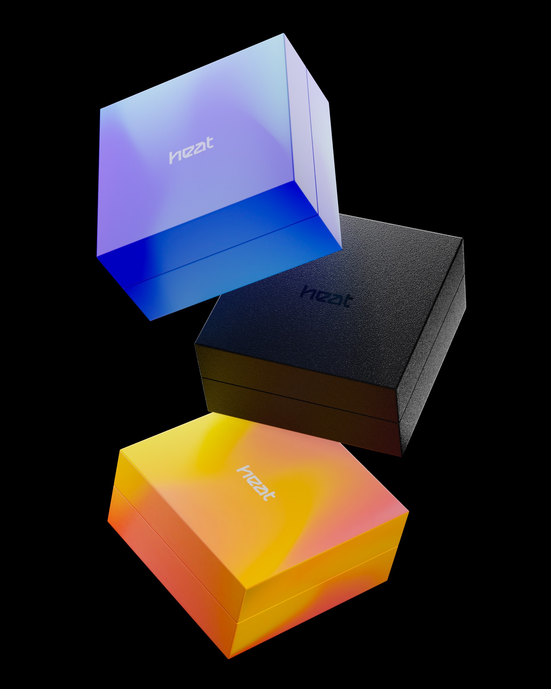 Three HEAT mystery boxes floating on black: one in a blue and violet gradient, one in textured black and one in yellow and orange.