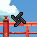Dark shuriken in the air in front of the red temple bridge and blue sky.