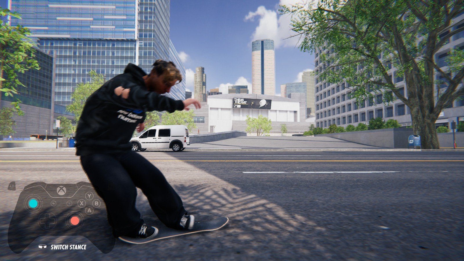 The 3D character crouches low on a skateboard on a city street, with a game controller overlay in the corner.