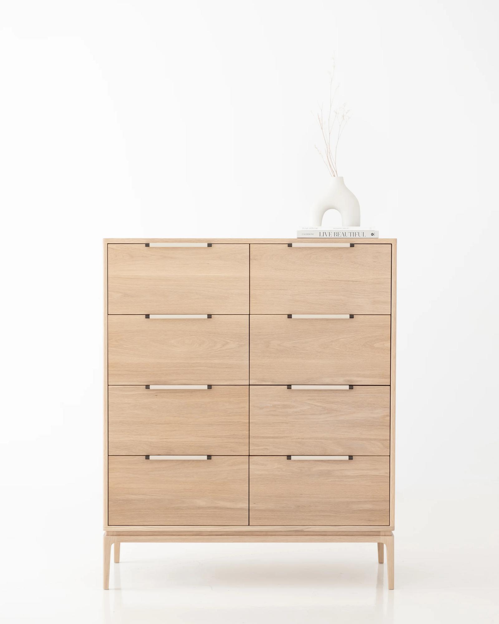 Wistow tall boy in white oak, eight-drawer front view