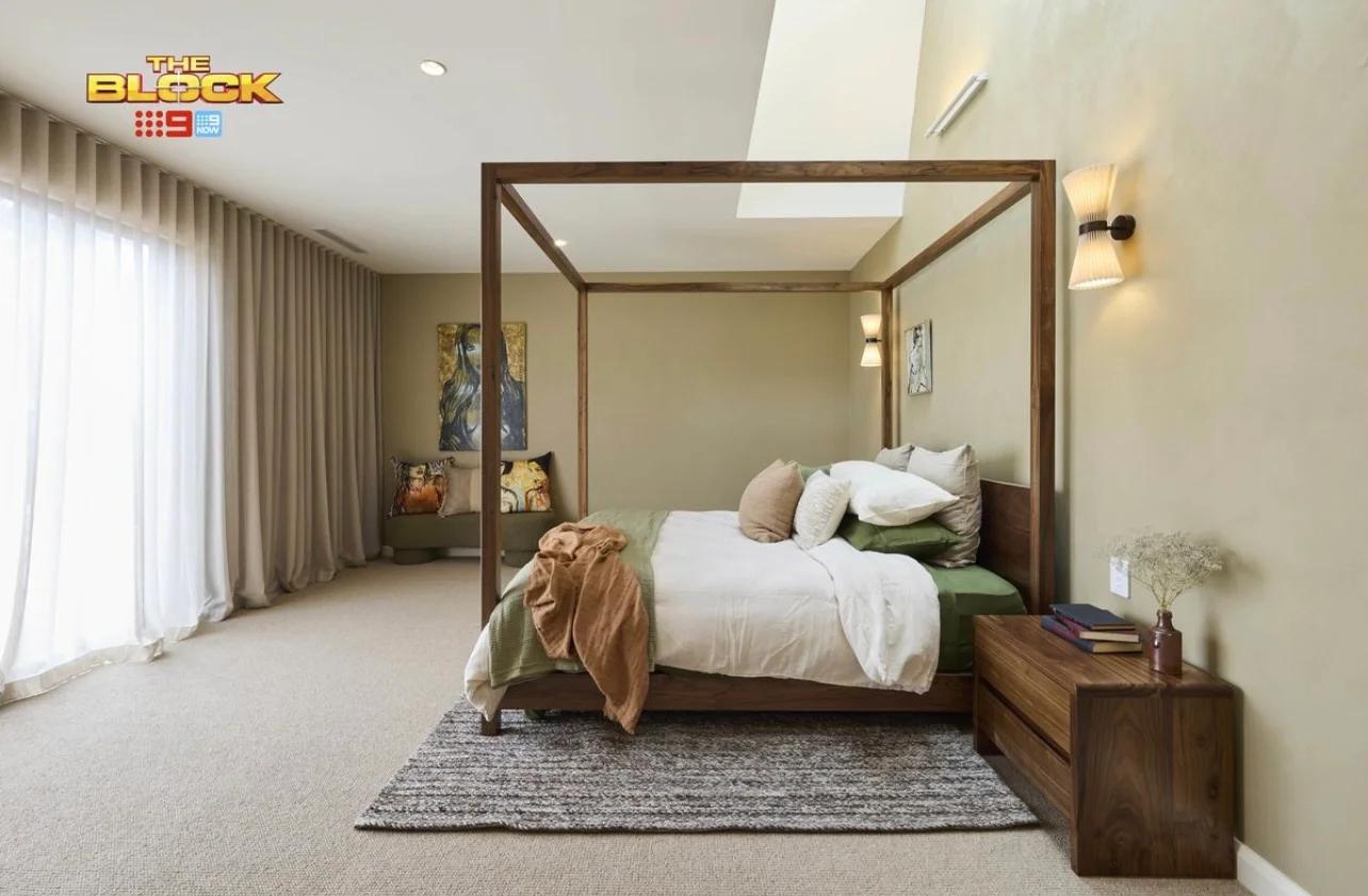 The Fetel Four Poster Bed beside a walnut Sova bedside table