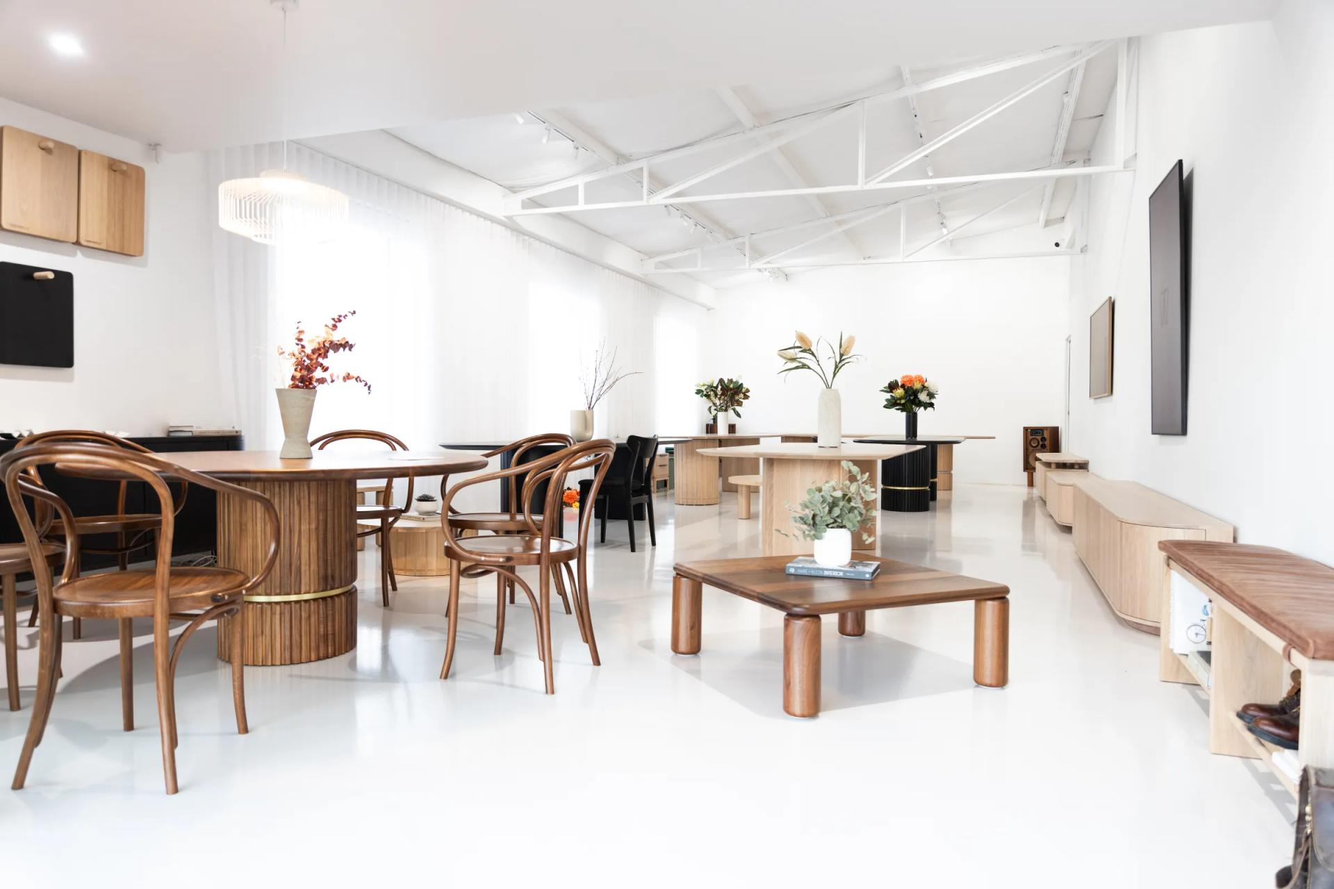 The Timberwolf Design showroom in Henley Beach, South Australia, set with handmade solid-timber tables, chairs, and cabinetry