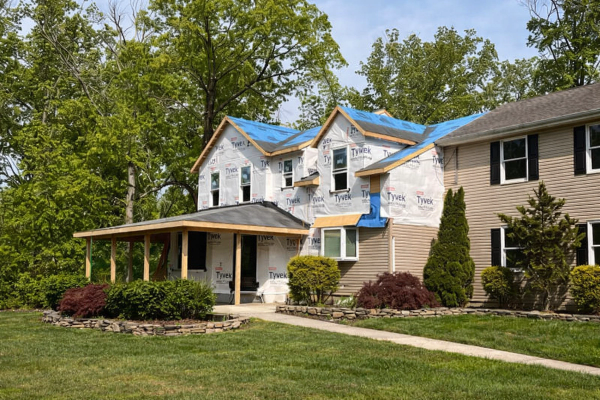 Home under construction showing renovation, addition, and new build elements