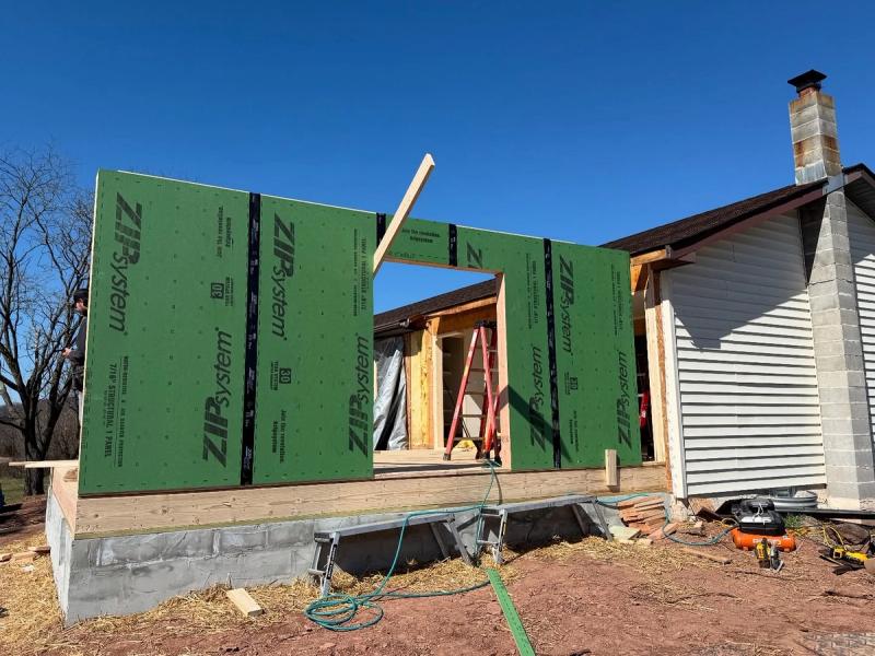 Photo of walls being erected for addition