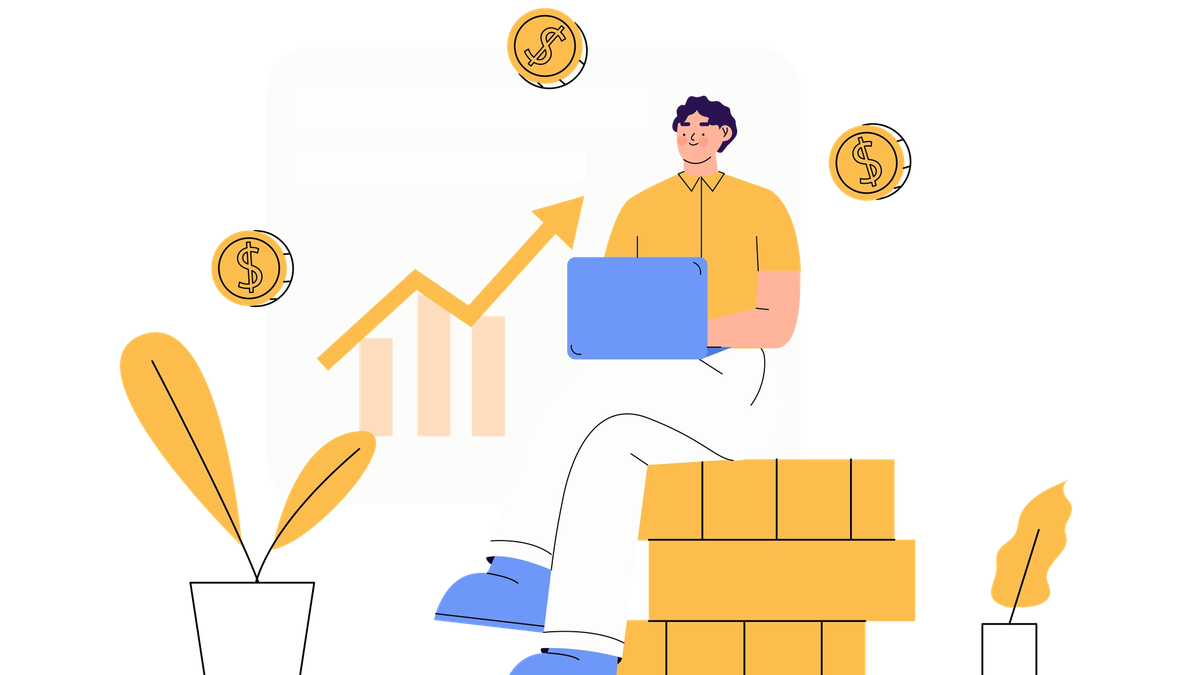 Person working on a laptop beside stacked coins and a rising profit chart