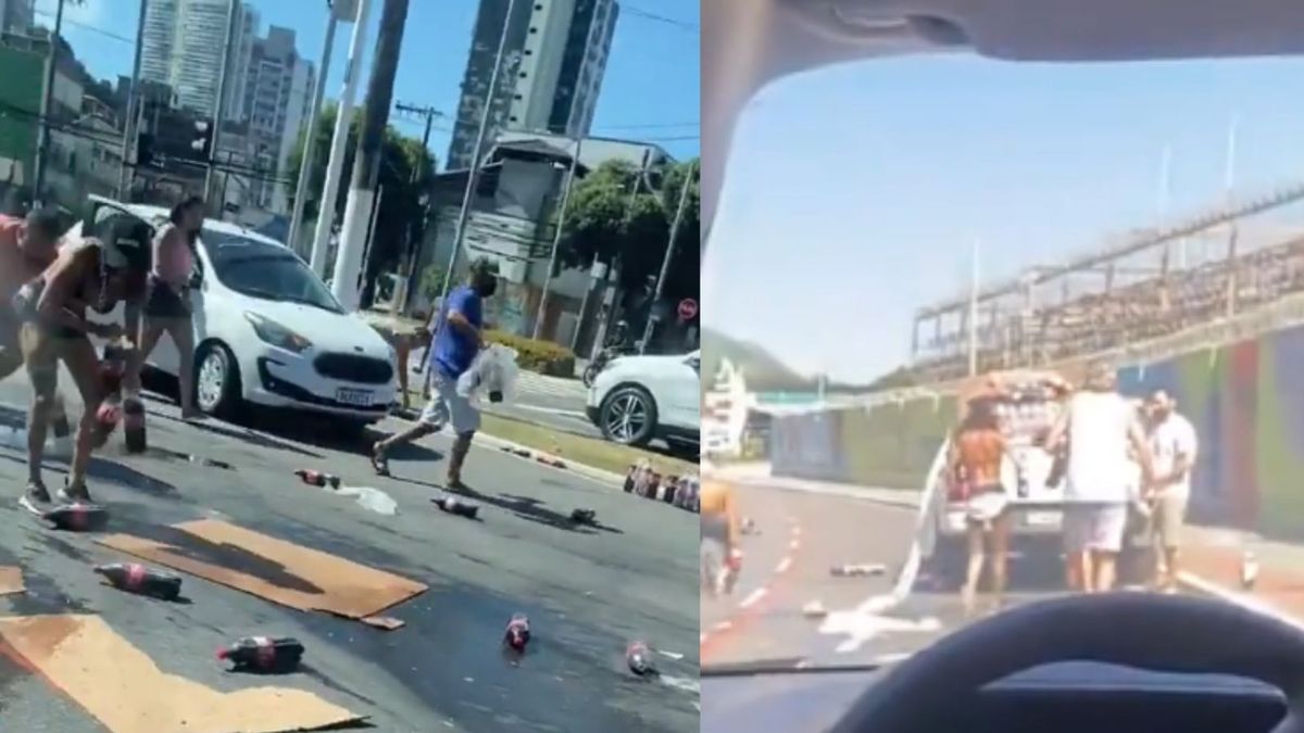Motoristas interrompem trânsito para ajudar condutor após queda de carga