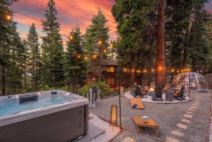Sunset over the fire pit, hot tub, and stargazing dome