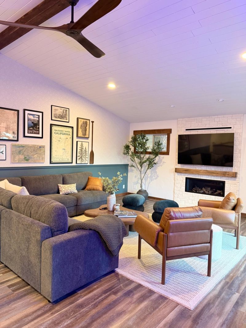 Living room sectional beside the gas fireplace
