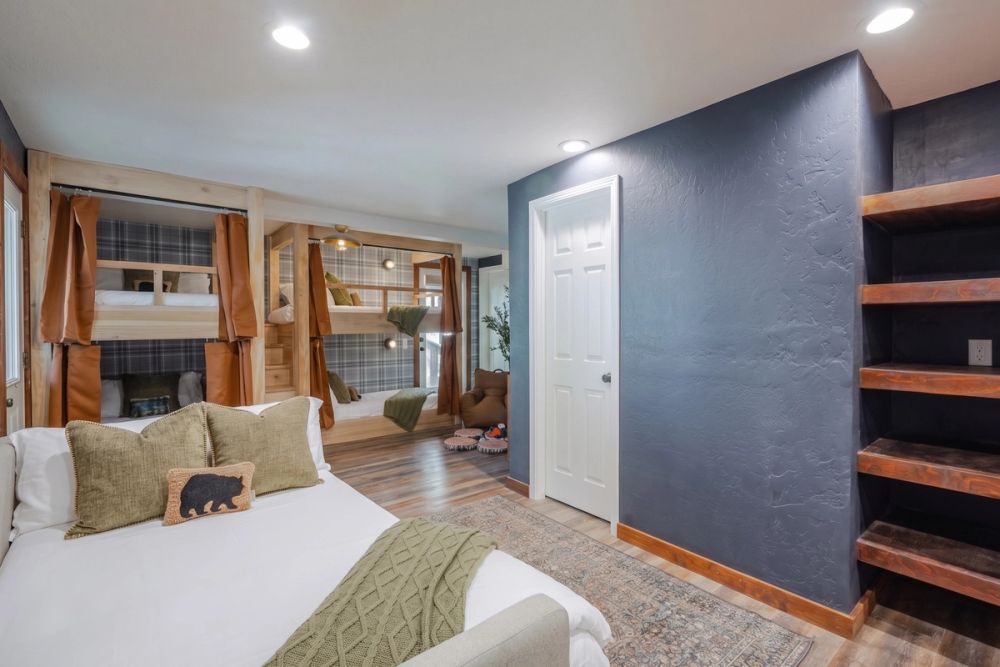 Bunk room with daybed and shelving