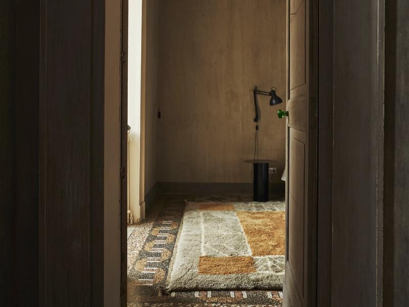 Onda rug seen through doorway. 