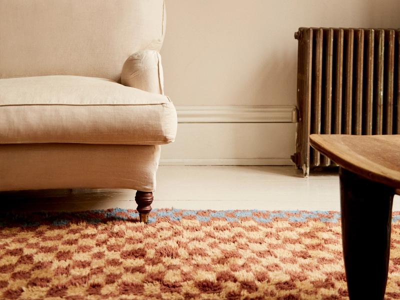 Rug under sofa. 