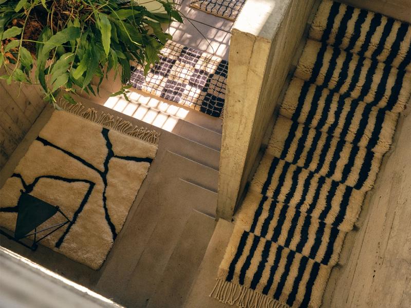 Wall Stripes rug on stairway. 