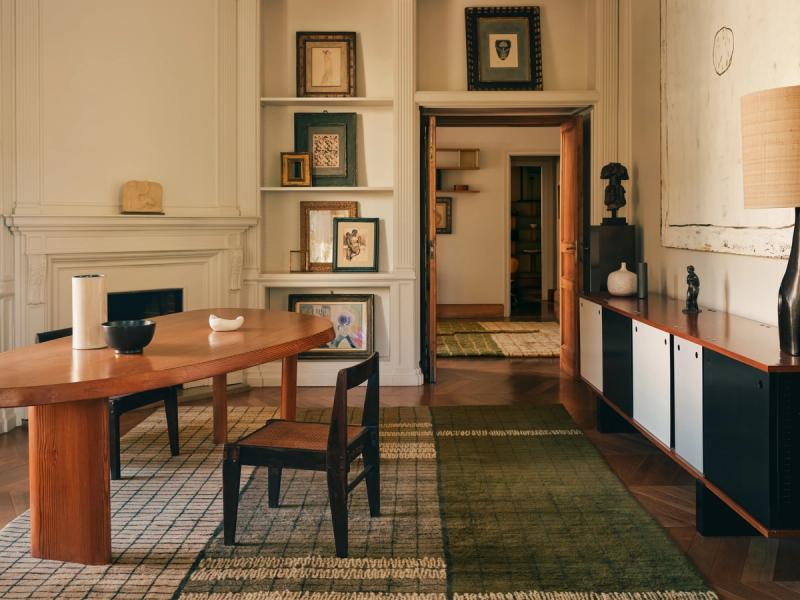 TIM-0312 rug under a desk and chairs. 