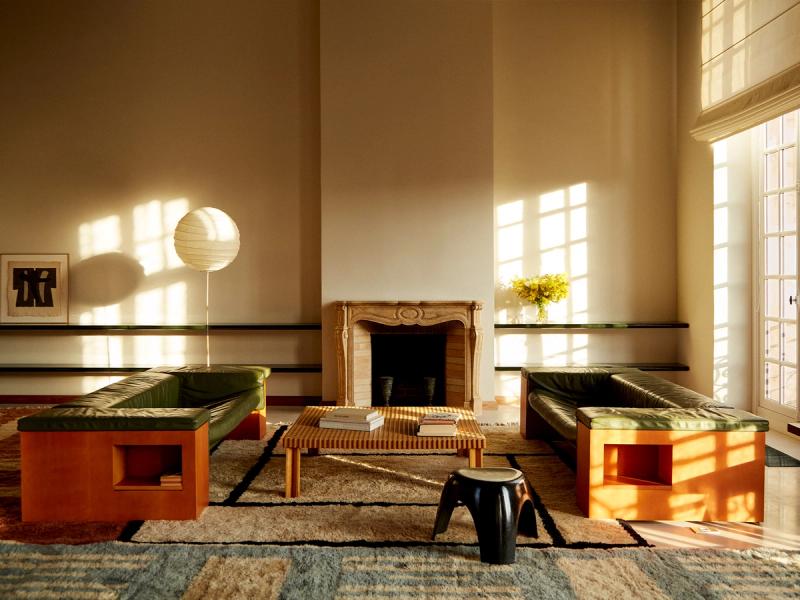 Layered rugs in living room. 