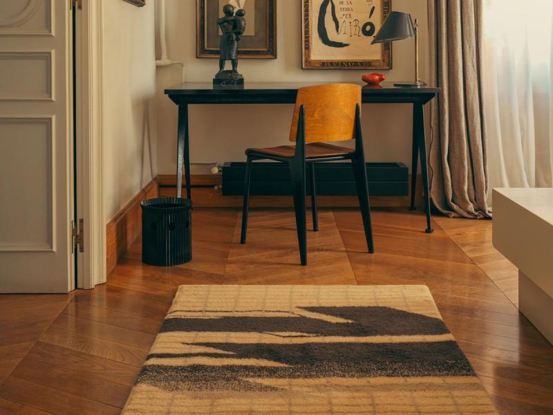 CAL-1040 in a bedroom in front of a desk and chair. 