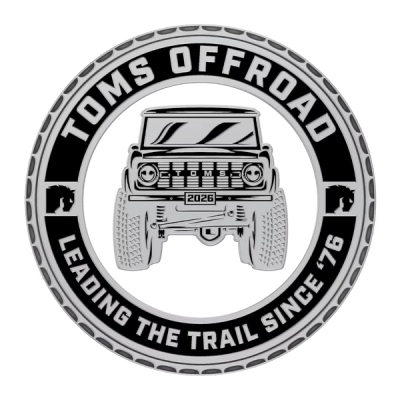 Tom's Offroad coin — Side A