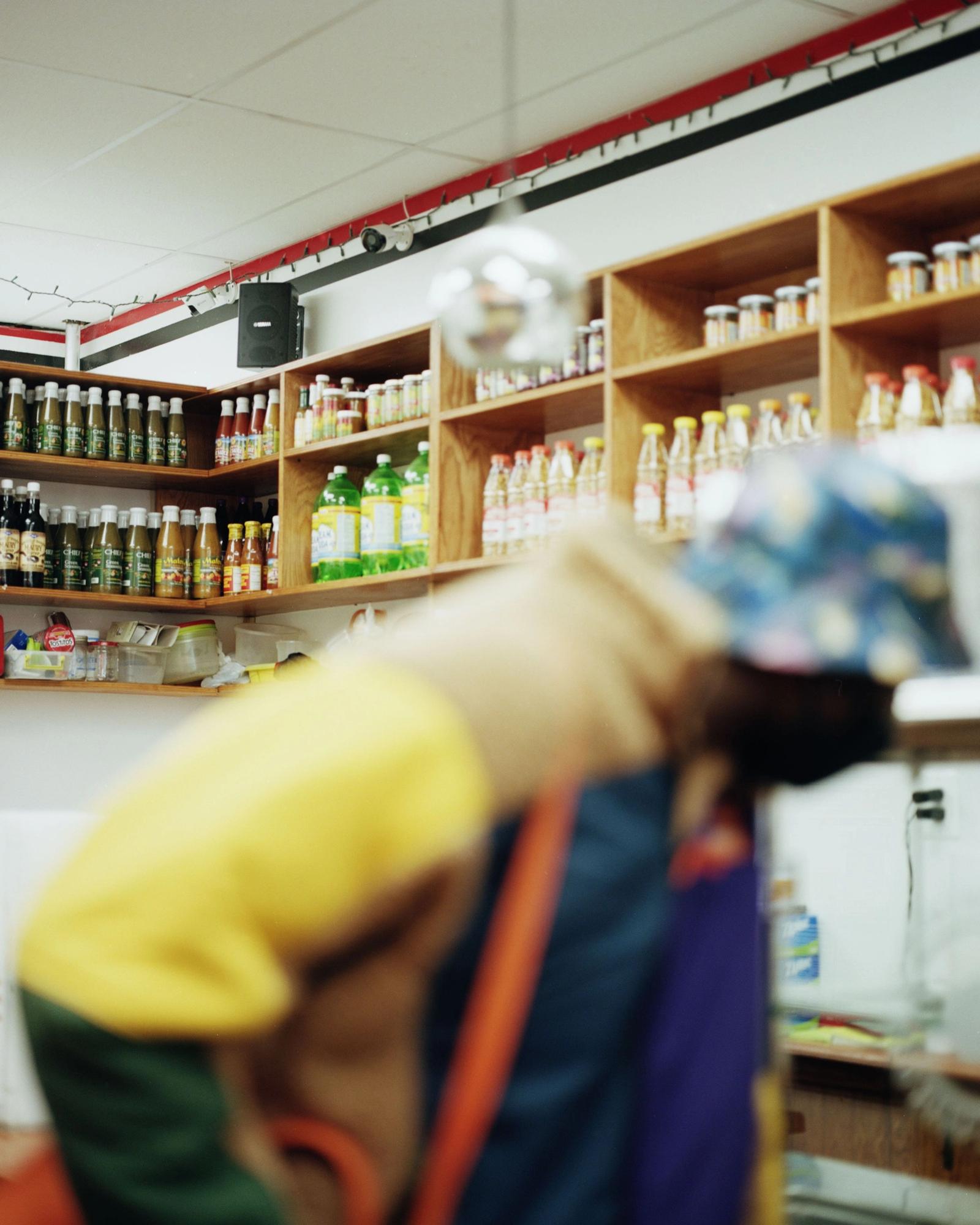 Shelves of beverage.