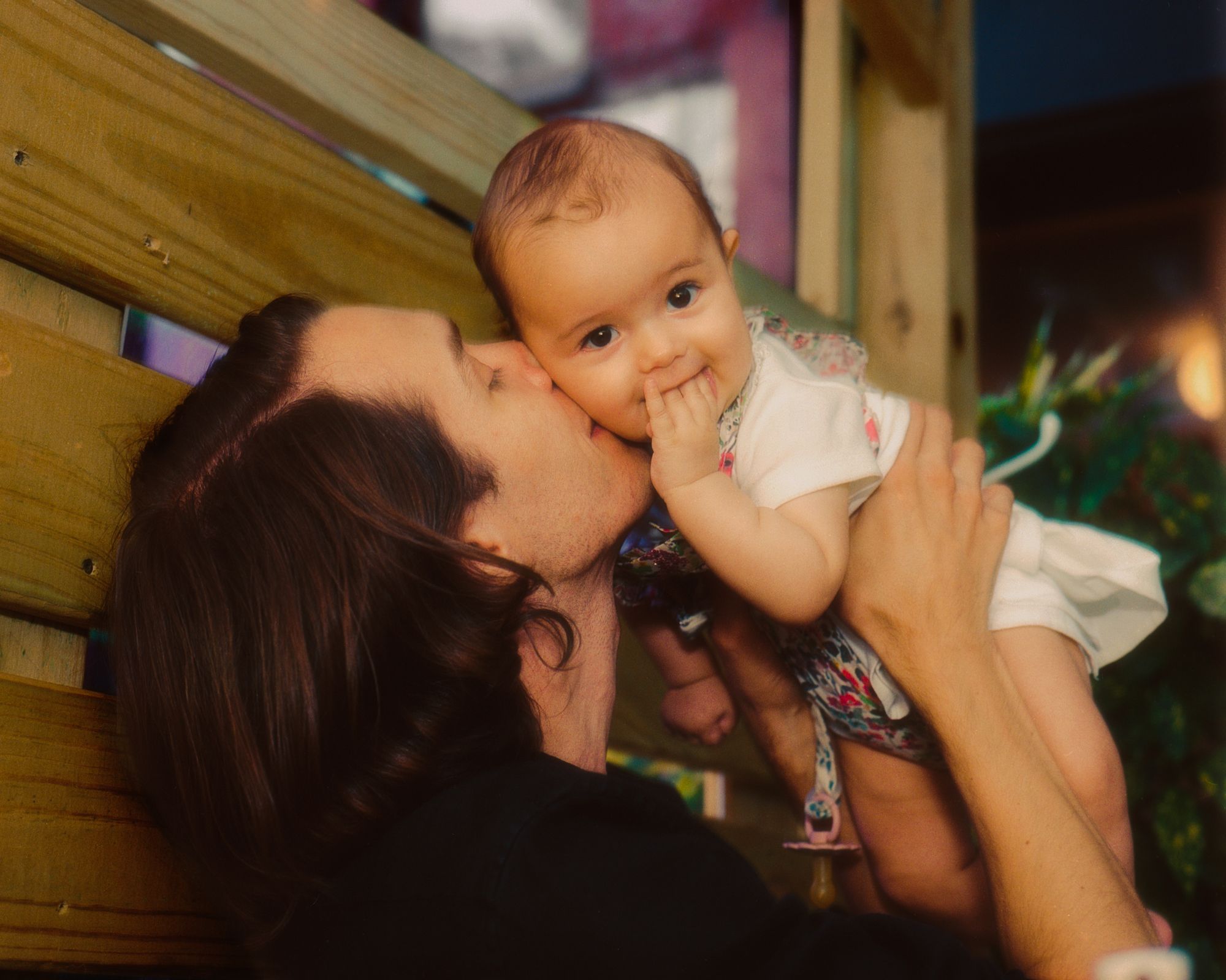 The chef holding a small baby