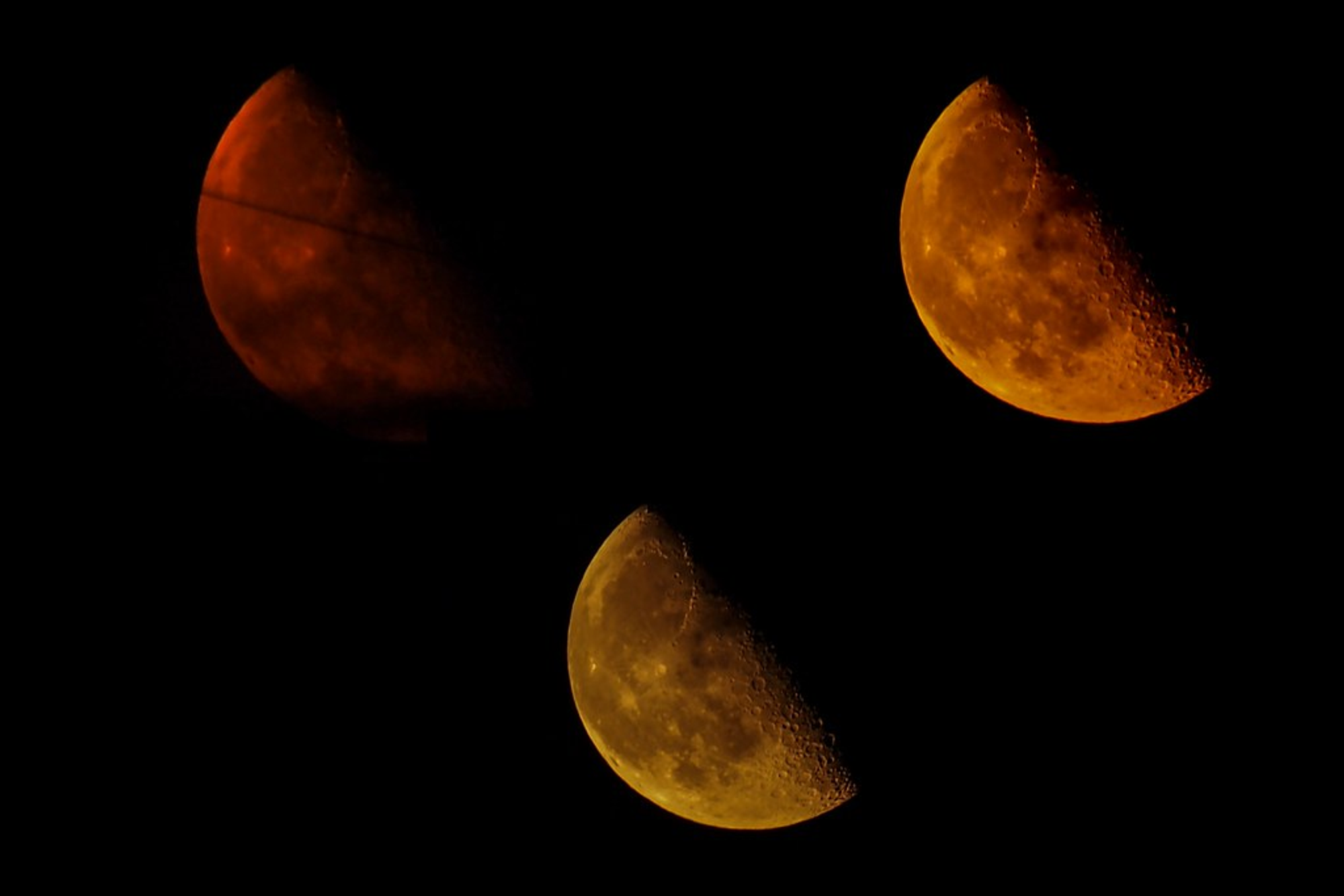 Three different views of hte last quarter moon as red, orange, and yellow