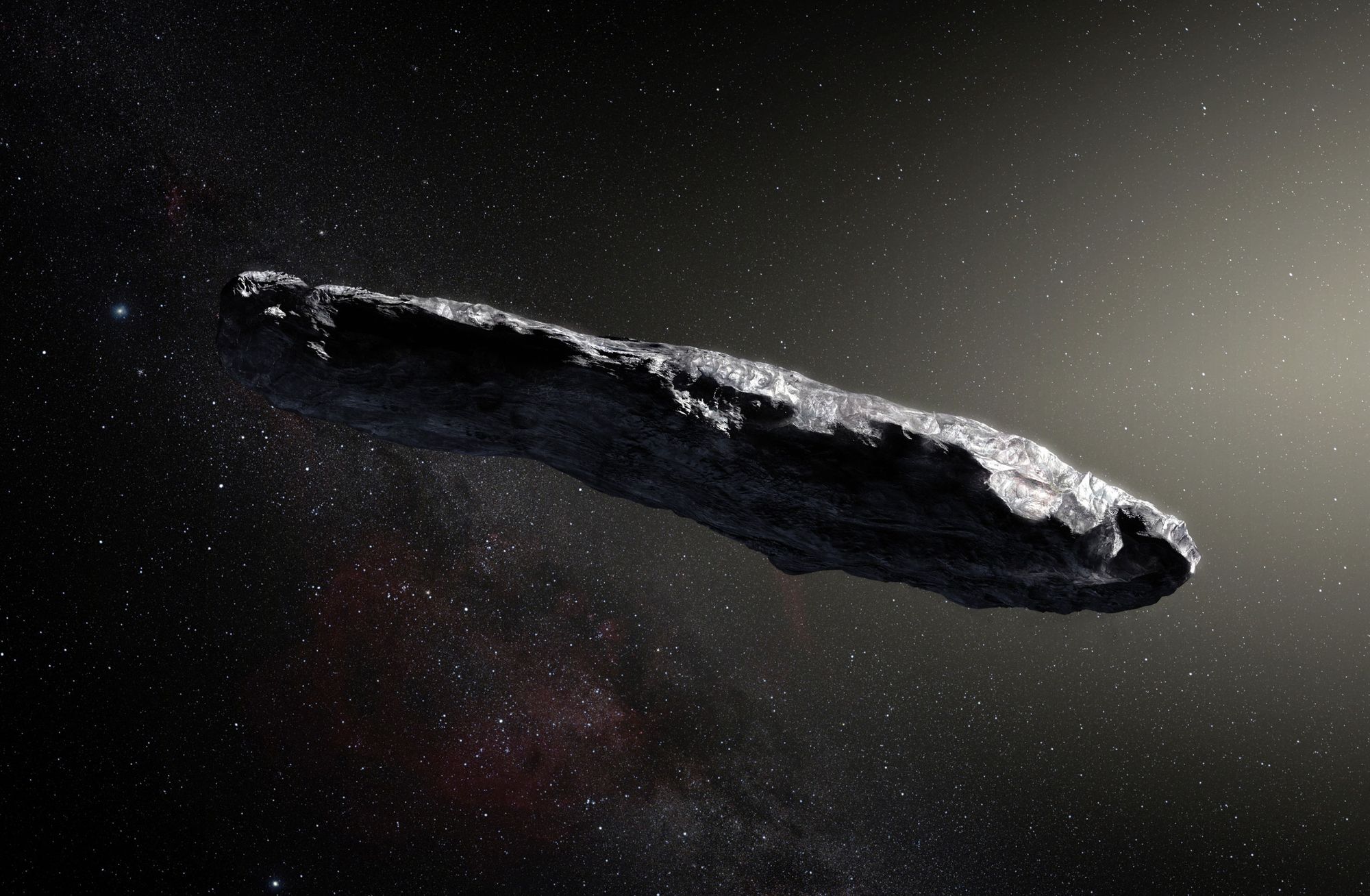 A large cigar-shaped rock floating in space.