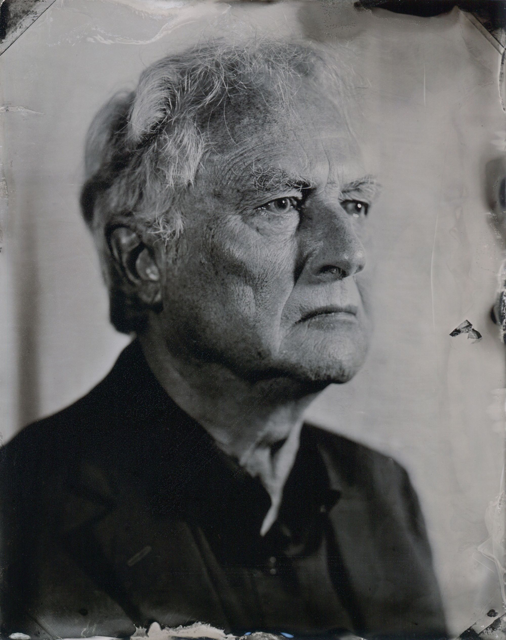 Portrait of Richard Dawkins printed on a piece of tin
