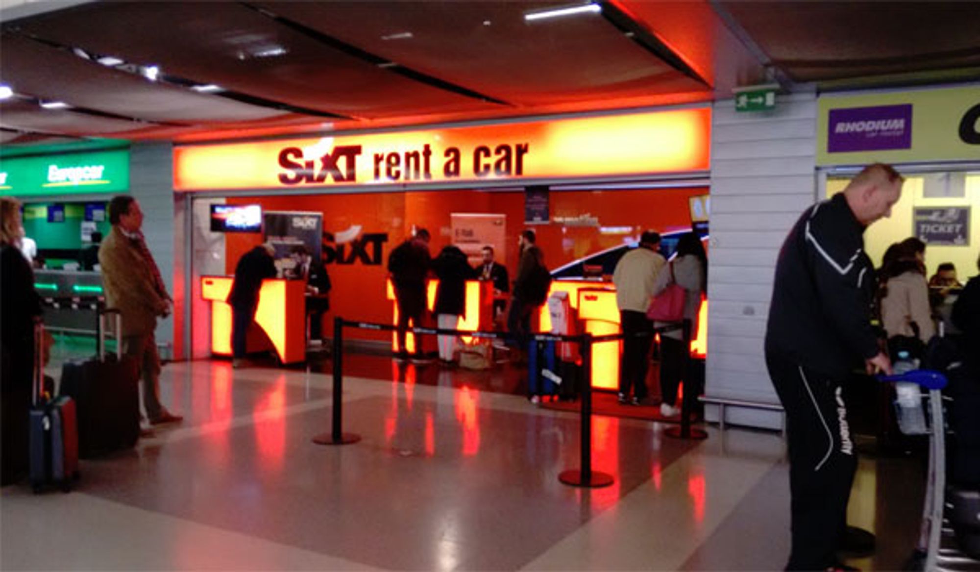 Photo of the Sixt Rent A Car counter in the Lisbon airport.